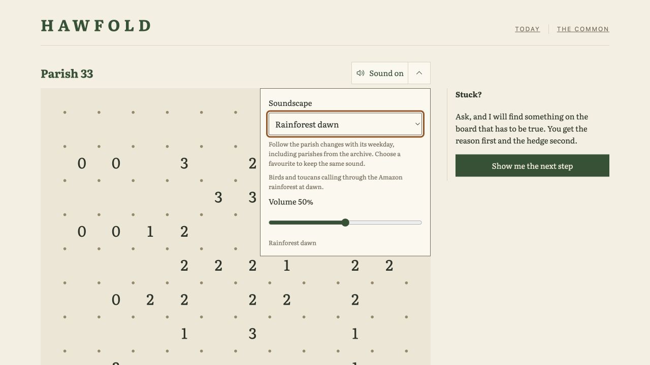 The Sound menu open above the daily puzzle, showing Rainforest dawn selected and the volume set to 50 per cent.